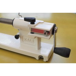 Pèle pomme- manivelle